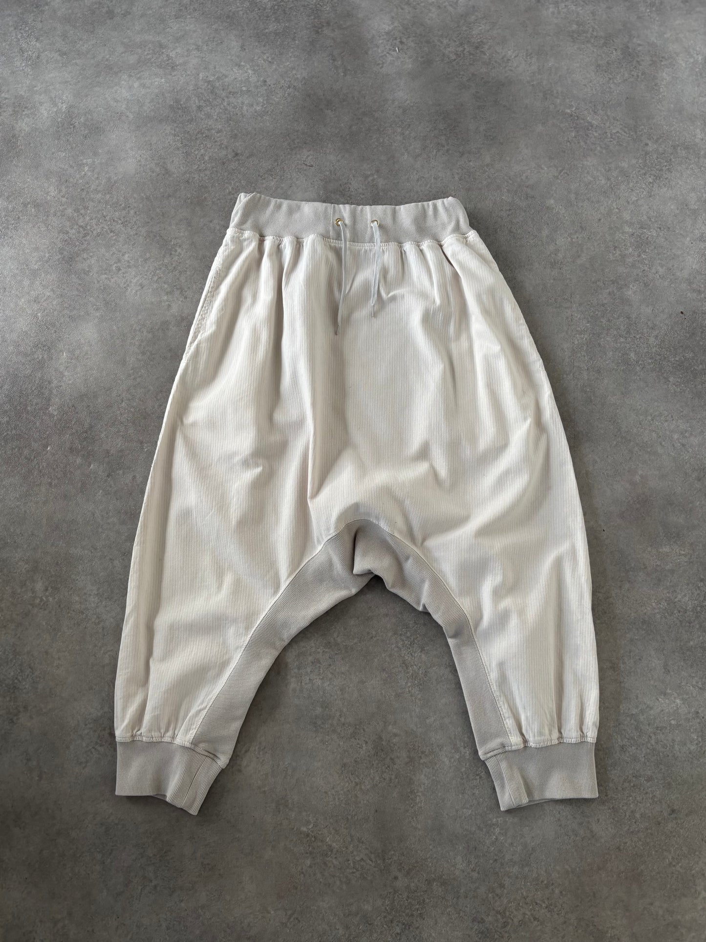 MERCIBEAUCOUP DROP CROTCH TROUSERS