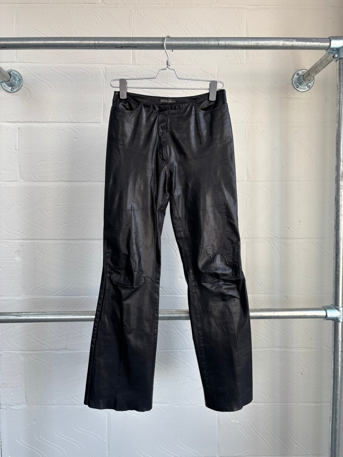 LEATHER TROUSERS WITH DETAILING ON KNEES