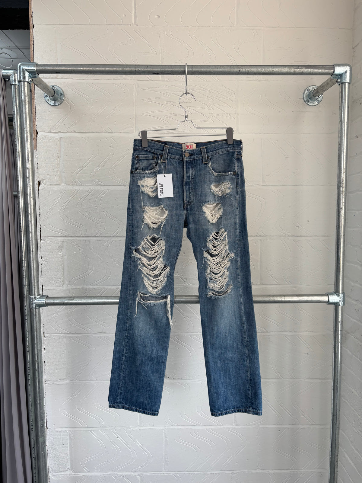 LEVI'S 501 RIPPED JEANS